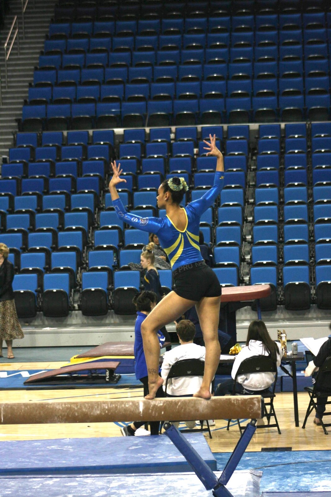 Brynnan Venters performing on beam