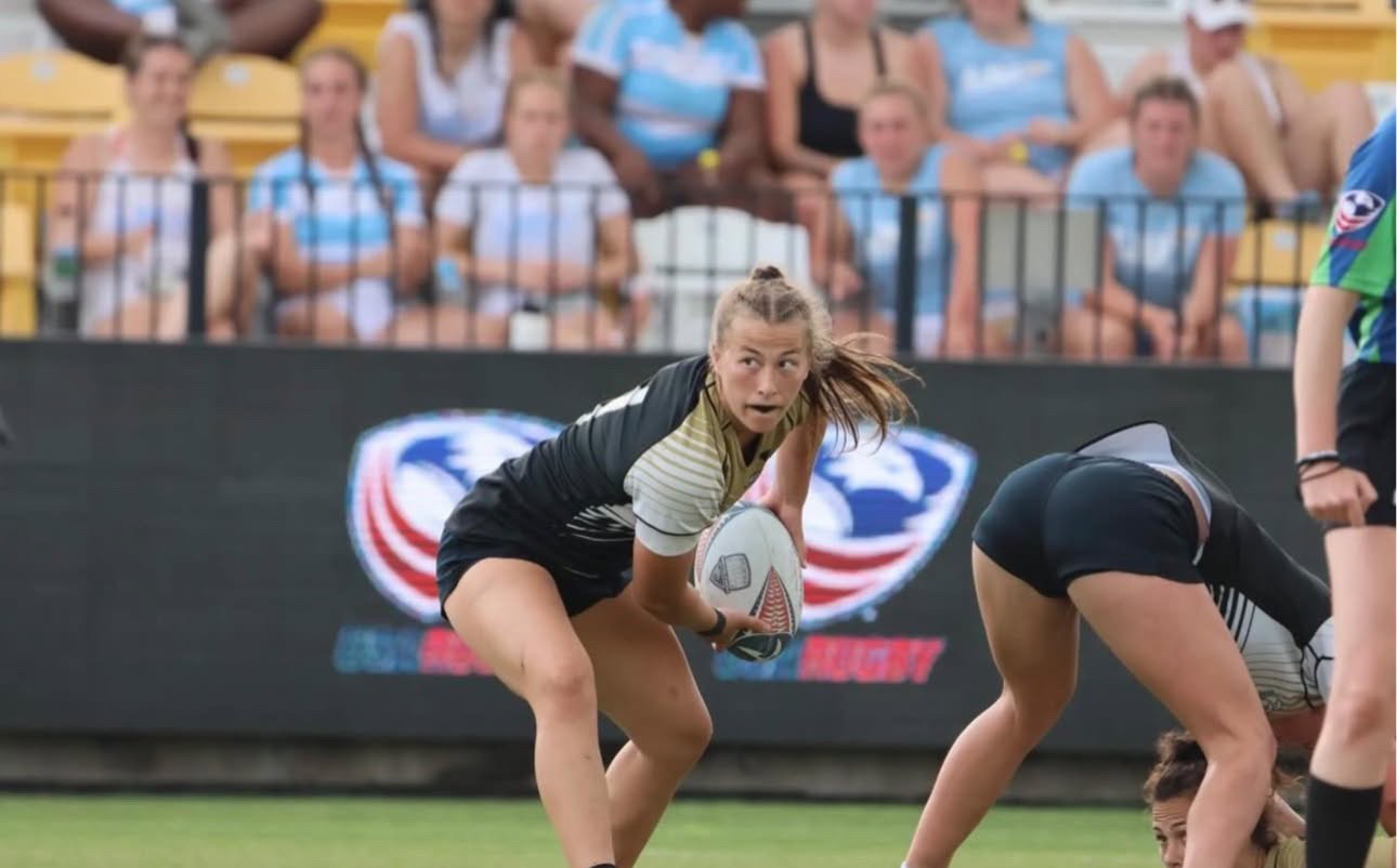 Makenna Bailey preparing a rugby pass